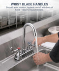 Phivan 4" Deck Mount Brass Kitchen Sink Faucet, 3-1/2" Gooseneck Spout with wrist blade handles in a busy kitchen.