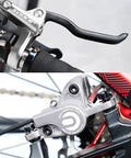 Close-up of Dual Piston Hydraulic Mountain Bike Brakes Set Left Front 1000mm And Right Rear 1700mm With Aluminum Alloy MTB Calipers.