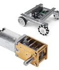 DC geared motor with brass gearbox beside a metal robot chassis with four white wheels.