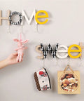 Rustic Wall Mounted Coat Hooks Solid Pine Wood Distressed Finish Super Tough Heavy Duty Multi Hook Rack For Coats Hats Keys Game Changer Bedroom Home Decor Organizer with hanging plush toy and small bags.