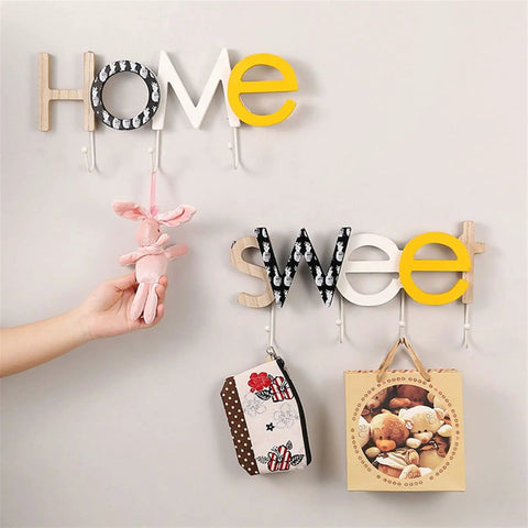Rustic Wall Mounted Coat Hooks Solid Pine Wood Distressed Finish Super Tough Heavy Duty Multi Hook Rack For Coats Hats Keys Game Changer Bedroom Home Decor Organizer with hanging plush toy and small bags.