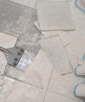 SDS Max Floor Scraper Heavy Duty Beast Pro Tool with Two Point Five Millimeter Blade for fast concrete demo in use on tile floor