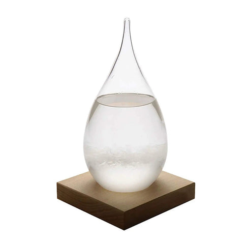 Front view of Storm Glass Weather Predictor with teardrop crystal bottle on wood base, ideal for home or office decor.