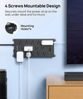 Beefed-Up Heavy Duty Surge Protector Power Strip With 5ft Cord, 13 Wide Spaced Outlets, wall-mounted in home office setup.