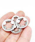 Hand holding Heavy Duty Snap Ring Kit 700Pcs Set M2.5 To M10 External Circlips Self Lock Retaining Clips For Shafts And Bearings