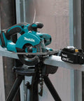 Game Changing 18V LXT Cordless Metal Cutter Shreds Steel Sheets Pipes Square Tubing And Unistrut 3600 RPM light metal cutter on tripod with 5Ah battery.