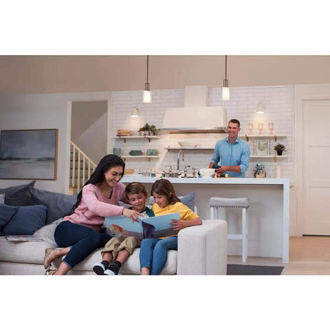 Family in living room with overhead lighting, showcasing Diva LED Plus Dimmer Switch For Dimmable LED CFL And Incandescent Bulbs 250W Single Pole Or 3 Way With Smooth Flicker Free Dimming 250 Levels And Compatibility Chart