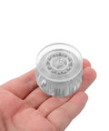 Furniture Casters with Brake Replacement Wheels for Cabinets, clear plastic wheel held in hand, ideal for cabinets.