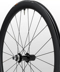 Side view of 105 Rs710 C46 Carbon Road Wheelset Tubeless 700c Hooked Rim 46mm Deep 28mm External Width Black