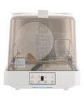 Front view of Portable Countertop Dishwasher Compact For Apartments And RV Trips featuring plates, utensils, and control panel.