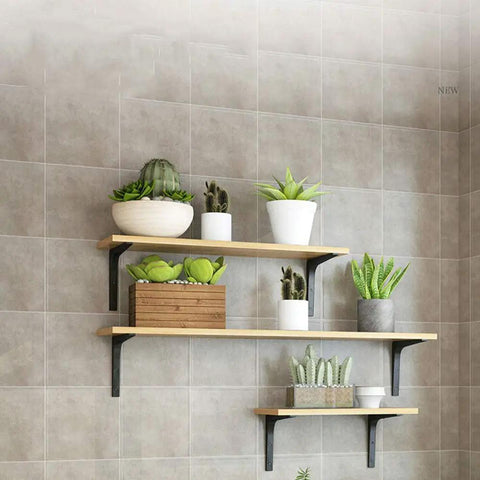 Rock Solid Triangle Steel Shelf Brackets Heavy Duty Wall Mounted Floating Hardware support wooden shelves with plants.