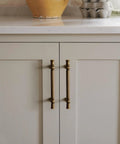 Antique Brass Cabinet Pulls With Three And Three Quarters Inch Hole Centers Zinc Alloy Classic Vintage Drawer Handles installed on cabinet