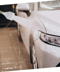 Heavy Duty Industrial Compressed Air Nozzle Spray Attachment in use on a car for efficient drying cleaning.