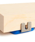Axle Inserter Guide For Pinewood Derby Cars, Easy And Precise Alignment For Straight Axles, metal clip on wooden block close-up