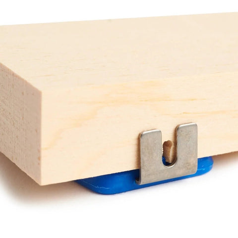 Axle Inserter Guide For Pinewood Derby Cars, Easy And Precise Alignment For Straight Axles, metal clip on wooden block close-up