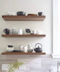 Kitchen shelves with dishes, showcasing Walnut Edge Banding Tape Roll Seven Eighth Inch By Two Hundred Fifty Feet Pre Glued