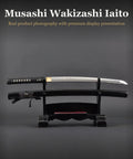 Aluminum Iaido Wakizashi Practice Sword With 21 Inch Blade for Safe Nukitsuke and Noto Drills displayed on stand
