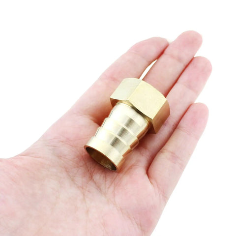 Two Pack Brass Hose Barb Fittings, Half Inch NPT Female To Three Quarter Inch Barb Adapter Connector held in hand
