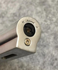 Close-up of Windproof Jet Torch Lighter With Locking Flame Viewable Flame Butane Cigar And Cigarette Lighter adjustment valve.