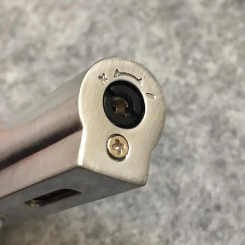 Close-up of Windproof Jet Torch Lighter With Locking Flame Viewable Flame Butane Cigar And Cigarette Lighter adjustment valve.