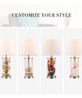 Maya 21 Inch Fillable Table Lamp With Clear Glass Base And White Linen Shade Coastal Transitional Style For Living Room Bedroom Or Home Office Fillable Base Lets You Add Personal Keepsakes Up To Ten Pounds displayed with fillable options.