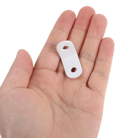 Person holding a single white bracket from the Beefy Heavy Duty 24 Piece Stainless Steel L Bracket Corner Braces For Wood Shelves And Cabinets