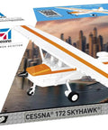 Cessna 172 Orange Skyhawk 1:48 Scale Building Set With 162 Pieces box showing model plane and skyline background.