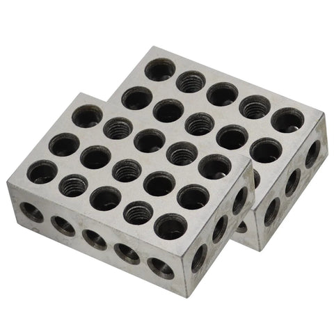 Front-angle view of two steel Jecoupoon 1-2-3 inch machinist setup blocks with 23 through holes