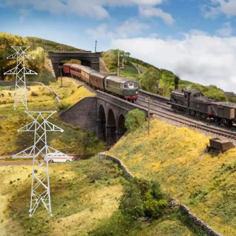 Totally Legit N Scale 1 160 Miniature Electric Transmission Tower in model railroad scenery with trains and landscape.