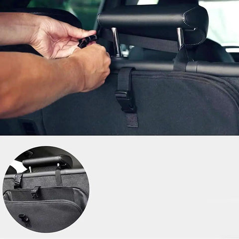 User attaching adjustable strap of EV cable tote to headrest for secure storage, showcasing heavy-duty design.