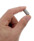 Close-up of hand holding 10 Pieces M8 Stainless Steel Thread Repair Sleeve Inserts Kit for reinforcing and protecting threads in automotive.