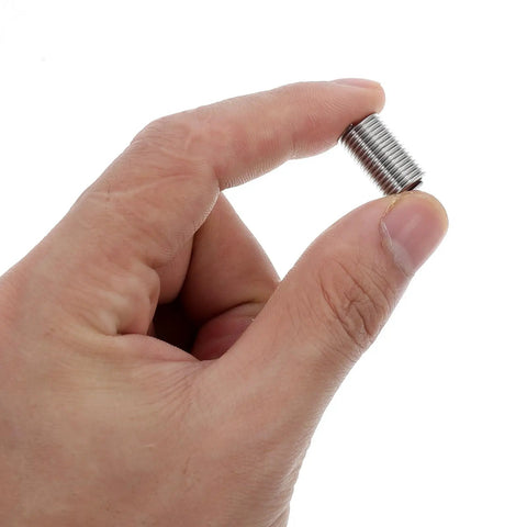Close-up of hand holding 10 Pieces M8 Stainless Steel Thread Repair Sleeve Inserts Kit for reinforcing and protecting threads in automotive.