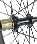 Close-up of Race Ready Carbon Road Wheelset 88mm Deep Clincher 700c with 23mm Width Fits Shimano Cassettes, black hub and spokes