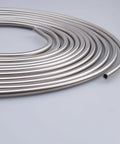 Stainless steel 1/4-inch brake line hard tubing, 16 ft coil; close-up view showing cut end.