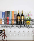 Straight Up Badass Wall Mounted Metal Wine Rack With Industrial Stemware Holder And Dual Row Bottle Organizer For Swanky Kitchen Or Home Bar Setup Black displaying bottles and glasses.
