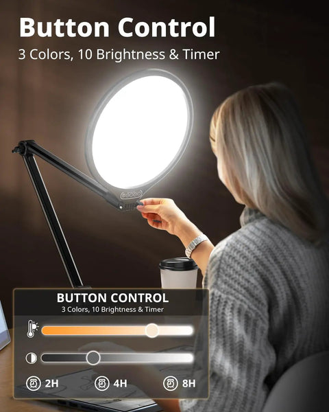 Person adjusting 10 Inch Key Light For Streaming With Adjustable Desk Arm in a dim room, showing button controls and timing options.