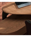 Top Tier Ash Wood Standing Desk With Smooth Height Adjustments And Spacious Corner Layout Made For Grinding Sessions Or Daily Office Grind, close-up of the ash wood surface and monitor riser.