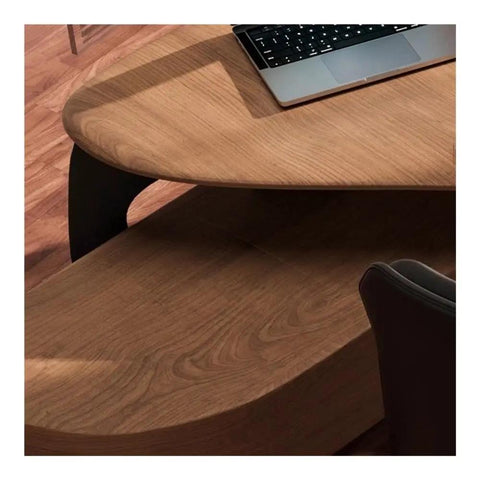 Top Tier Ash Wood Standing Desk With Smooth Height Adjustments And Spacious Corner Layout Made For Grinding Sessions Or Daily Office Grind, close-up of the ash wood surface and monitor riser.