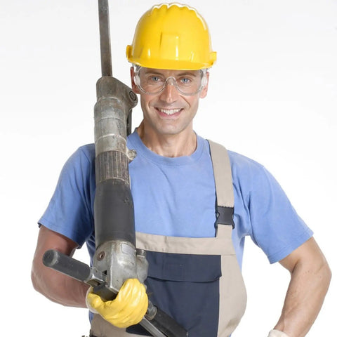 A construction worker wearing Tough As Nails Safety Goggles Featuring Antifog Coating And Impact Resistant Lenses.
