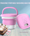 Portable Folding Mini Washer for Delicates and Small Things Like Baby Clothes and Underwear, Great for Apartments, Camping, RVs, and Travel, Wide Voltage 110V-240V, Pink, A Handy Gift for On-the-Go Lifestyles displayed with lid and folded design.