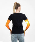 Woman wearing Ice Silk Arm Sleeves For Outdoor Use Moisture Wicking Breathable Long Sleeve With Thumb Hole Custom Pattern Yacht Style Lake Michigan Sunset Nautical Vibe For Summer Activities, back view showing orange gradient pattern