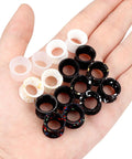 Variety of Silicone Ear Gauges Tunnels Plugs For Ears 10mm 00G Black Invisible Stretching Kit in hand