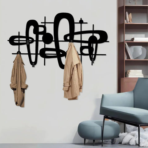 Slick Mid Century Metal Coat Rack With Abstract Wall Hooks, two coats hanging, stylish entryway decor on white wall.