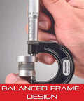Close-up of outside micrometer with one-piece spindle, satin chrome finish, balanced frame design, held in hand, showing measurement.