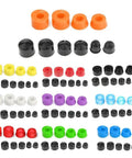 Colorful skateboard truck rebuild kit with PU bushings, swivel washers, and shock absorbers on white background for smoother ride.