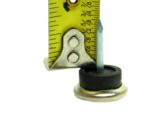 Forty Eight Pack Metal Nail On Furniture Glides With Thick Padding For Wooden Chairs And Tables showing size with tape measure.