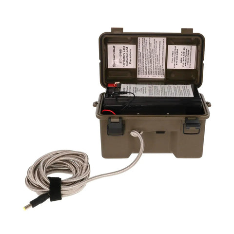 Rugged 12 Volt Battery Box For Trail Cameras with charger cord in open position, designed for freezing conditions.