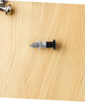 Heavy Duty Stainless Steel Reset Spring Indexing Plunger With Knockout Self Locking Grip on wooden surface.