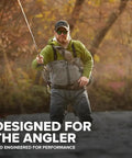 Angler using Beginner Fly Rod Outfit For Young Anglers 9 Foot 5 Weight 4 Piece Rod With Reel Line in a river setting.