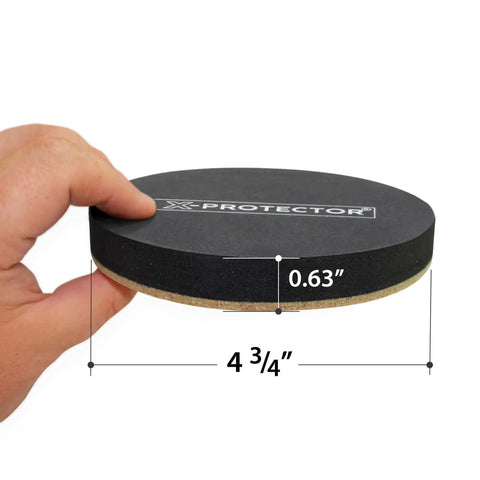 Hand holding Heavy Duty Felt Furniture Slider 4 3/4 inch thick, part of 8 pack for moving furniture on hardwood floors smoothly